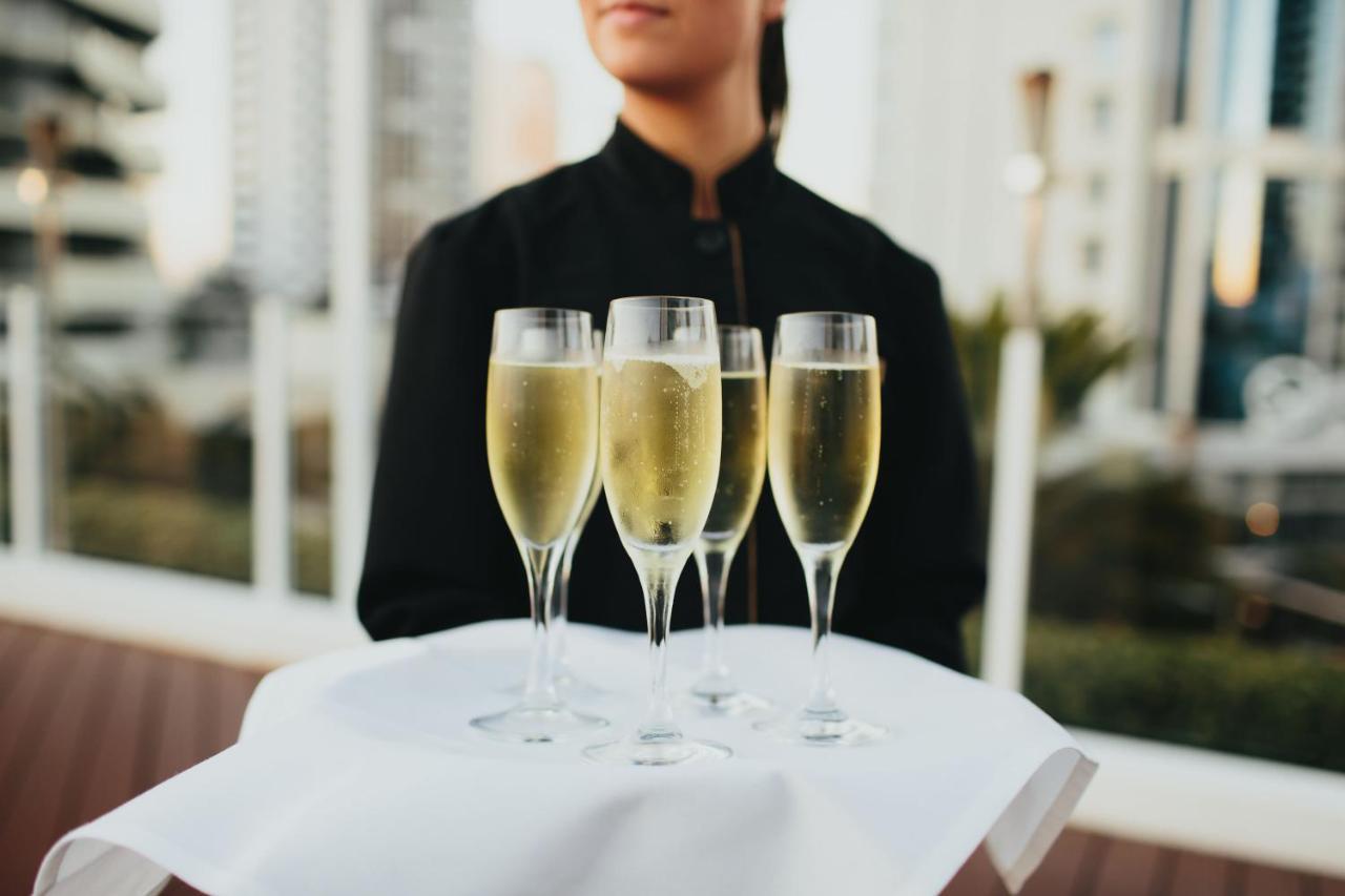 Sofitel Gold Coast Broadbeach Экстерьер фото A tray of champagne